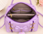 Premium Soft Purple Embossed Leather Satchel Handbag with Bow, Matching Pompom & Gold Accents - Image 4